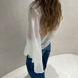 Camisa branca em musselina SEMICOUTURE com mangas abertas