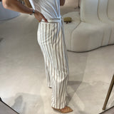 Conjunto ecru com risca camel