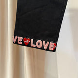 Calças LOVE MOSCHINO em Preto