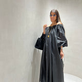 Vestido de musselina em preto semicouture