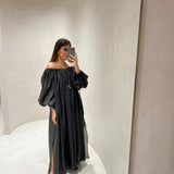 Vestido de musselina em preto semicouture