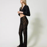 Conjunto Twinset de cardigan e calça em croché preto