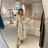 Vestido comprido com bolsos