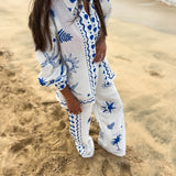 Conjunto de camisa e calça com estampado azul