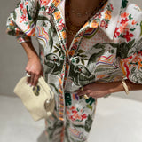Conjunto de camisa e calça com estampado florido verde