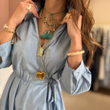 Vestido midi em azul céu com laço a trespasse no