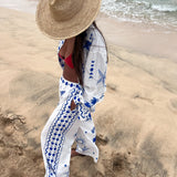 Conjunto de camisa e calça com estampado azul