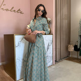 Vestido camiseiro midi com padrão verde