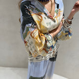 Conjunto de camisa e calça com estampado azul