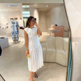 Vestido de musselina Semicouture em branco