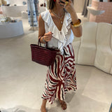 Saia animal print em linho