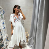 Vestido em algodão branco com bordados