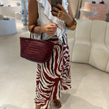Saia animal print em linho