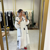 Vestido boho chic branco com bordado azul