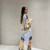 Conjunto de camisa e calça com estampado azul