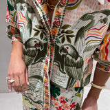 Conjunto de camisa e calça com estampado florido verde