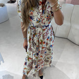 Vestido camiseiro midi com padrão colorido