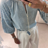Calça pantalona branca com pregas