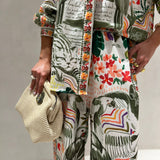 Conjunto de camisa e calça com estampado florido verde