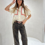 Calça em sarja animal print