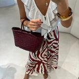 Saia animal print em linho