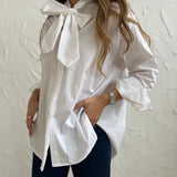 Camisa de laço em popelina branca