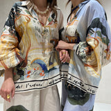 Conjunto de camisa e calça com estampado azul